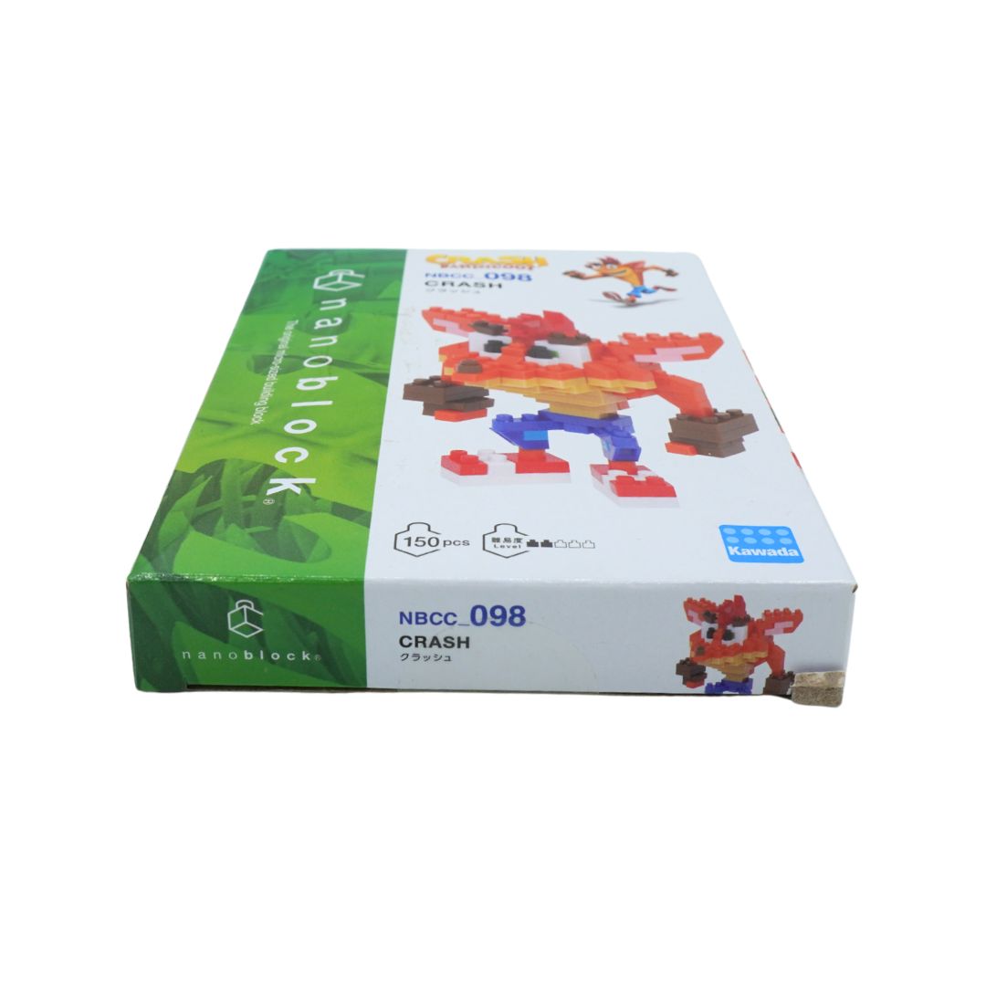Nanoblocks NBCC. 098 Crash toy building block set in its original retail box, featuring a white and green design with a pixelated cartoon character.