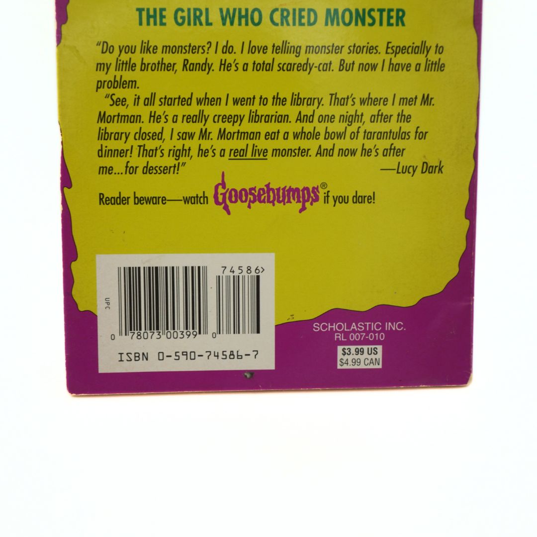 Back cover of a book with text and a barcode, featuring the Goosebumps series branding.
