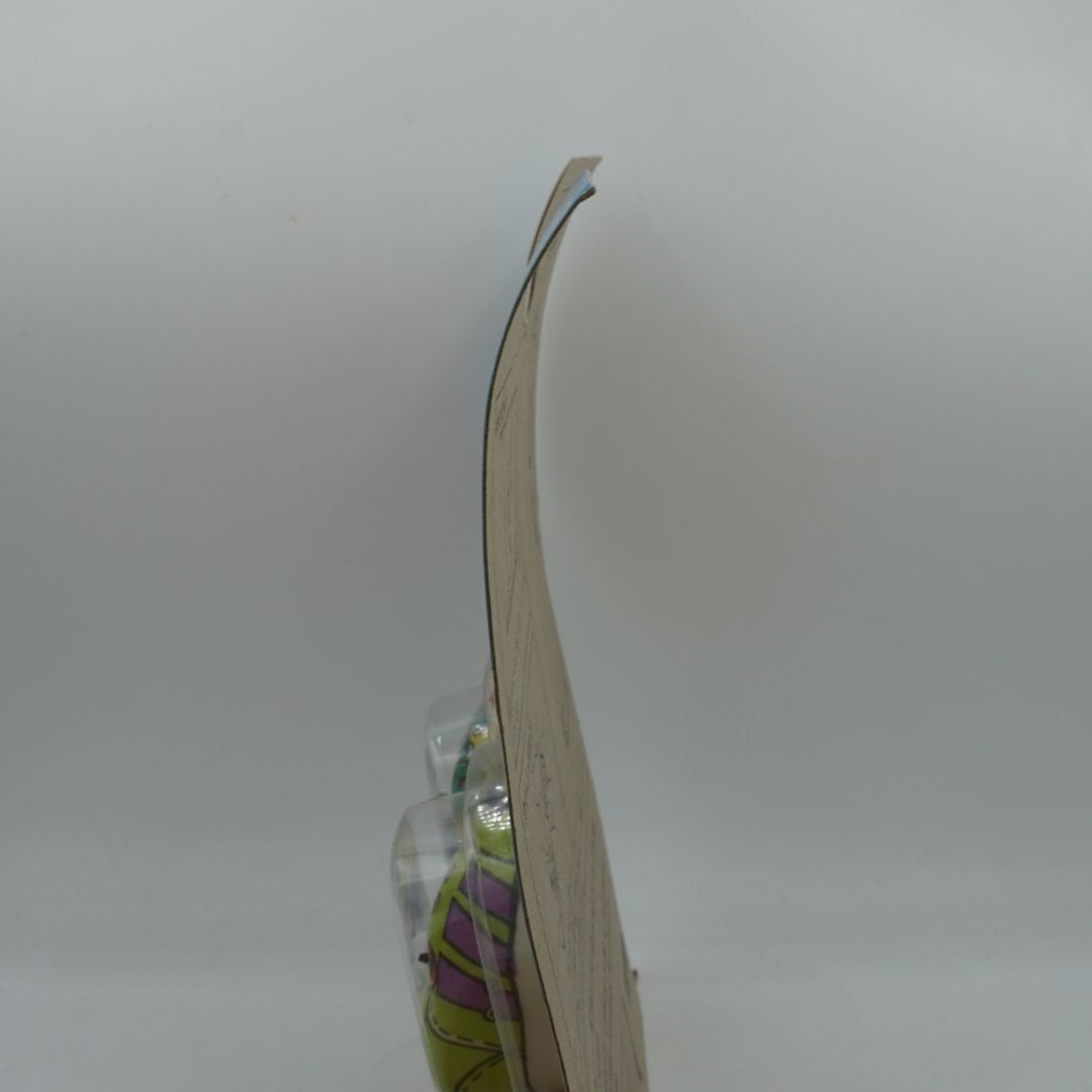 Curved piece of paper with text on a white background