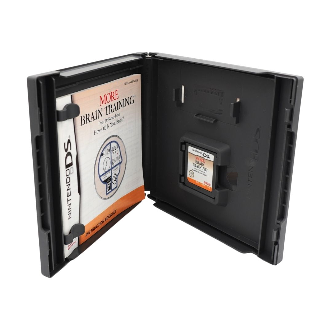 Nintendo DS brain training game case shown open, with the game cartridge installed on the right side and the game manual visible on the left.