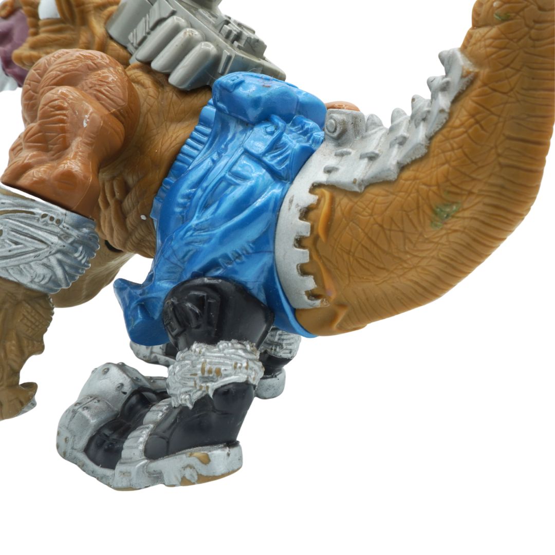 Close-up of a toy figure with mechanical parts on a white background