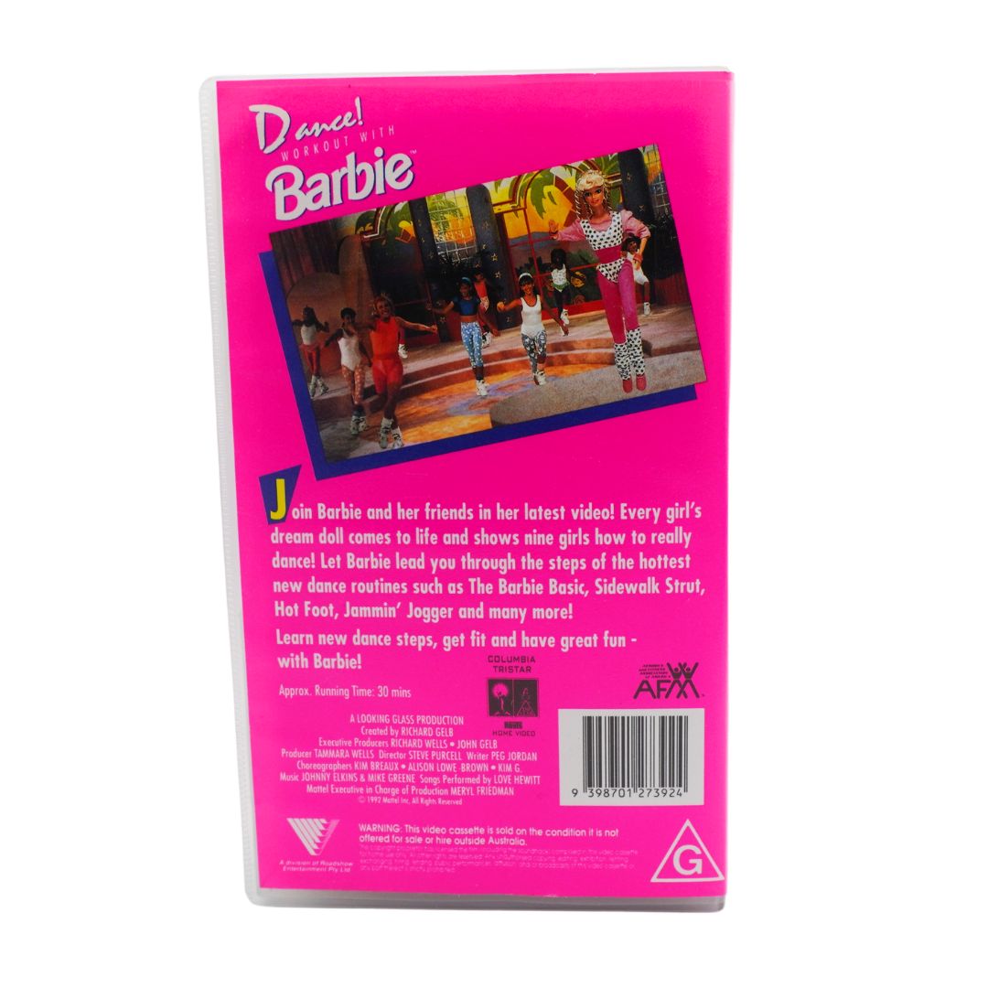 A hot pink cover of a VHS for Dance! Workout With Barbie, featuring Barbie in a star themed workout outfit