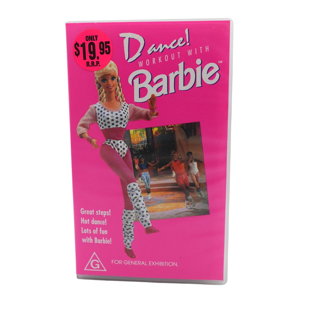 A hot pink cover of a VHS for Dance! Workout With Barbie, featuring Barbie in a star themed workout outfit