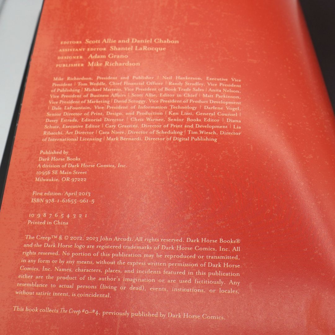 The back cover of a book titled 'Creep' from Dark Horse Comics, featuring white text printed on a textured red background.