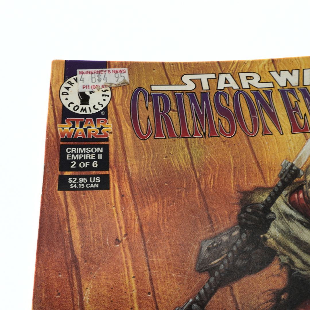 Comic book cover titled 'Star Wars Crimson Empire II' on a wooden surface.