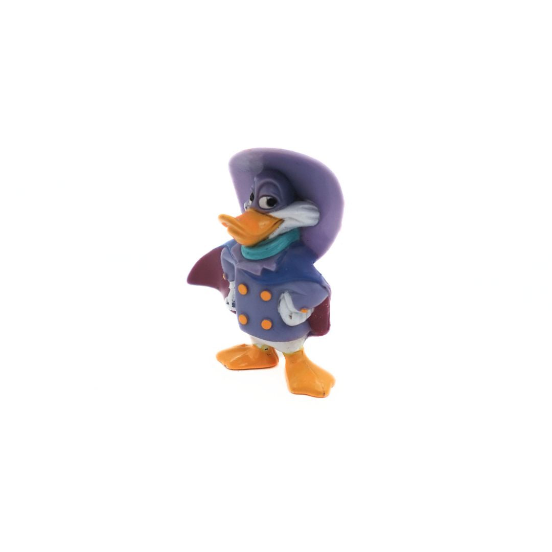 1994 McDonalds Darkwing Duck figure with his hands on his hips and cape blowing in the wind