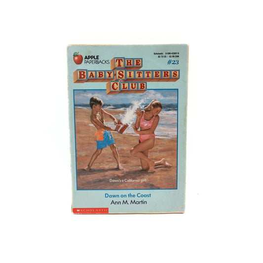 Front cover of the first edition Babysitters Club #23 Dawn on the Coast paperback