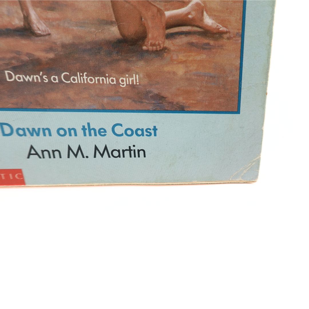 Creasing on the front cover of the Dawn on the Coast paperback