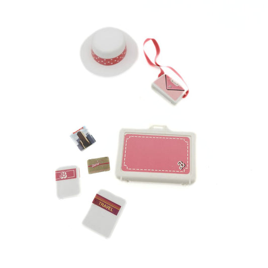 A Barbie Day to Night Accessory set released in 1985 including a hat, purse and briefcase