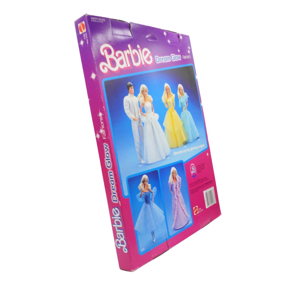 Barbie Dream Glow packaging with images of dolls in gowns on a white background