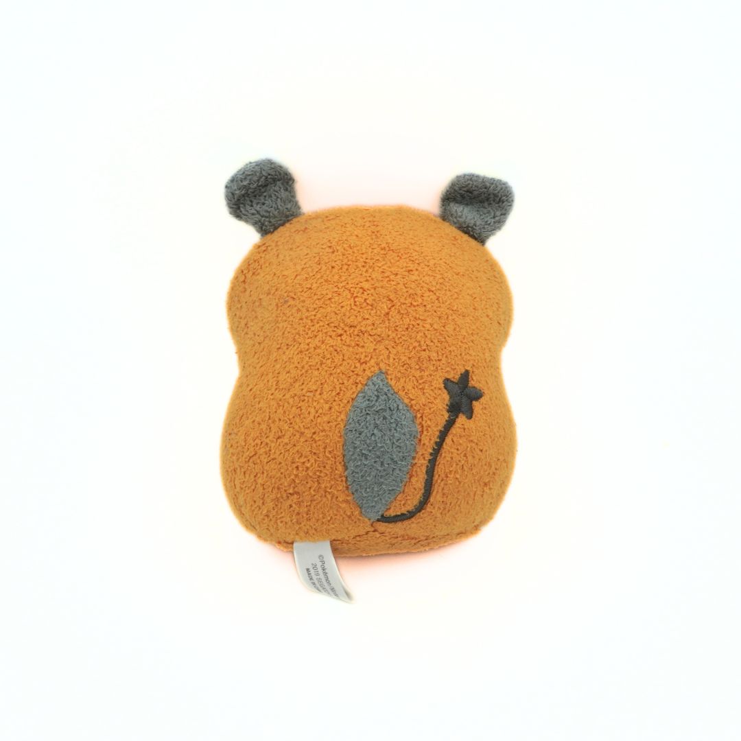 Back of a 2019 Sega Toys Dedenne Pokemon plush with grey ears and a grey tail