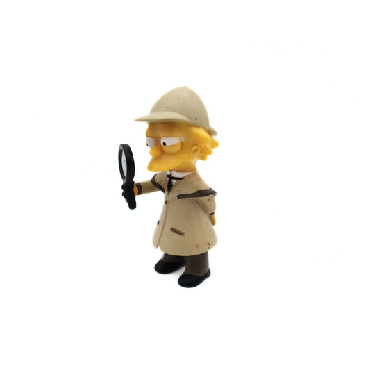 A 2006 The Simpsons figurine of Lisa Simpson dressed as a detective