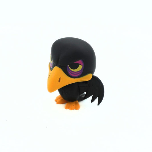 A small black raven figurine with a bright orange beak and feet, and purple and yellow eye details, standing on a white background.