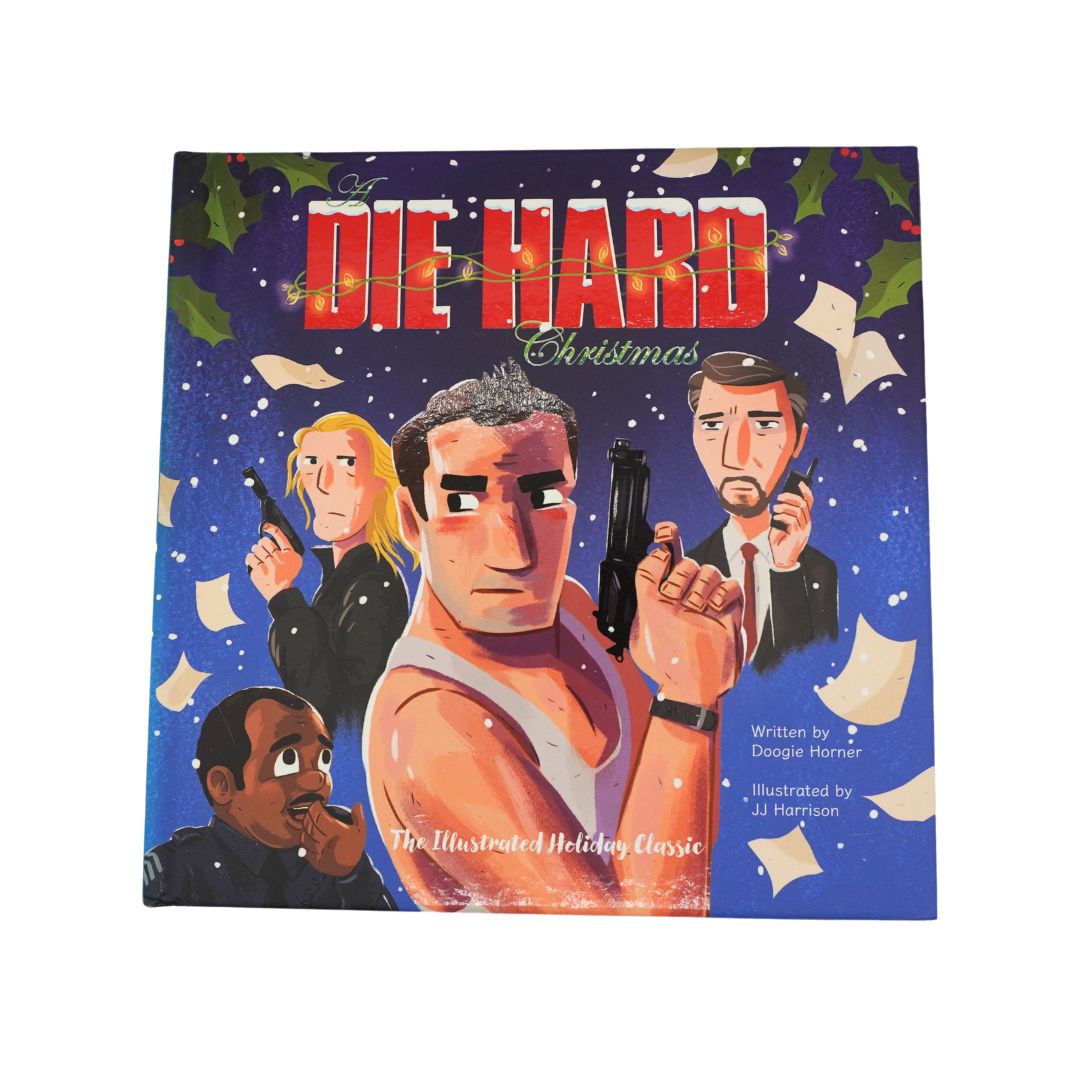 Front cover of the illustrated Die Hard book with a blue backdrop, showing the main characters. It is photographed on a white background