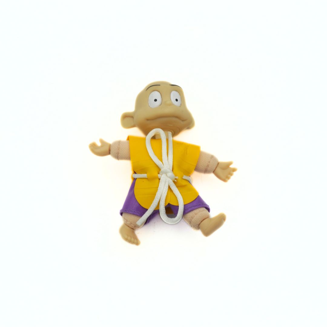 A 90s Rugrats Dil Pickles toy with a life vest on, released as a Beach Collectible