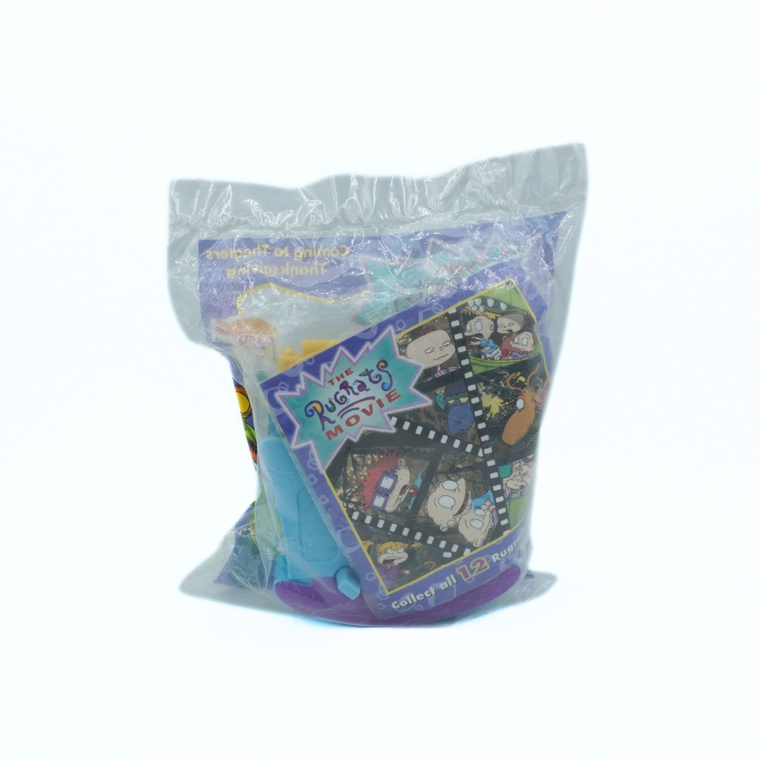 Packaged collectible toys with colorful graphics on a white background