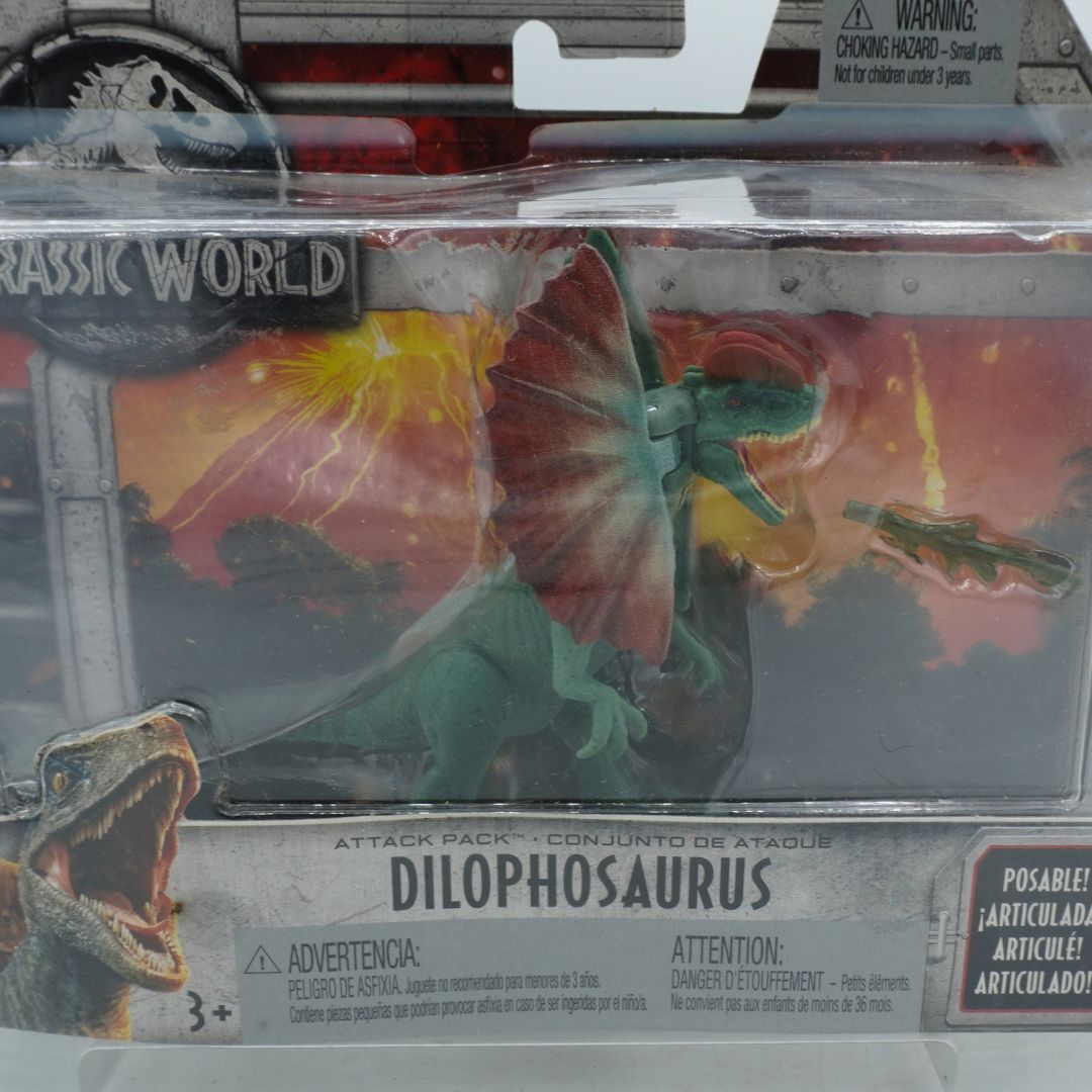 Toy Dilophosaurus in packaging with 'Jurassic World' branding