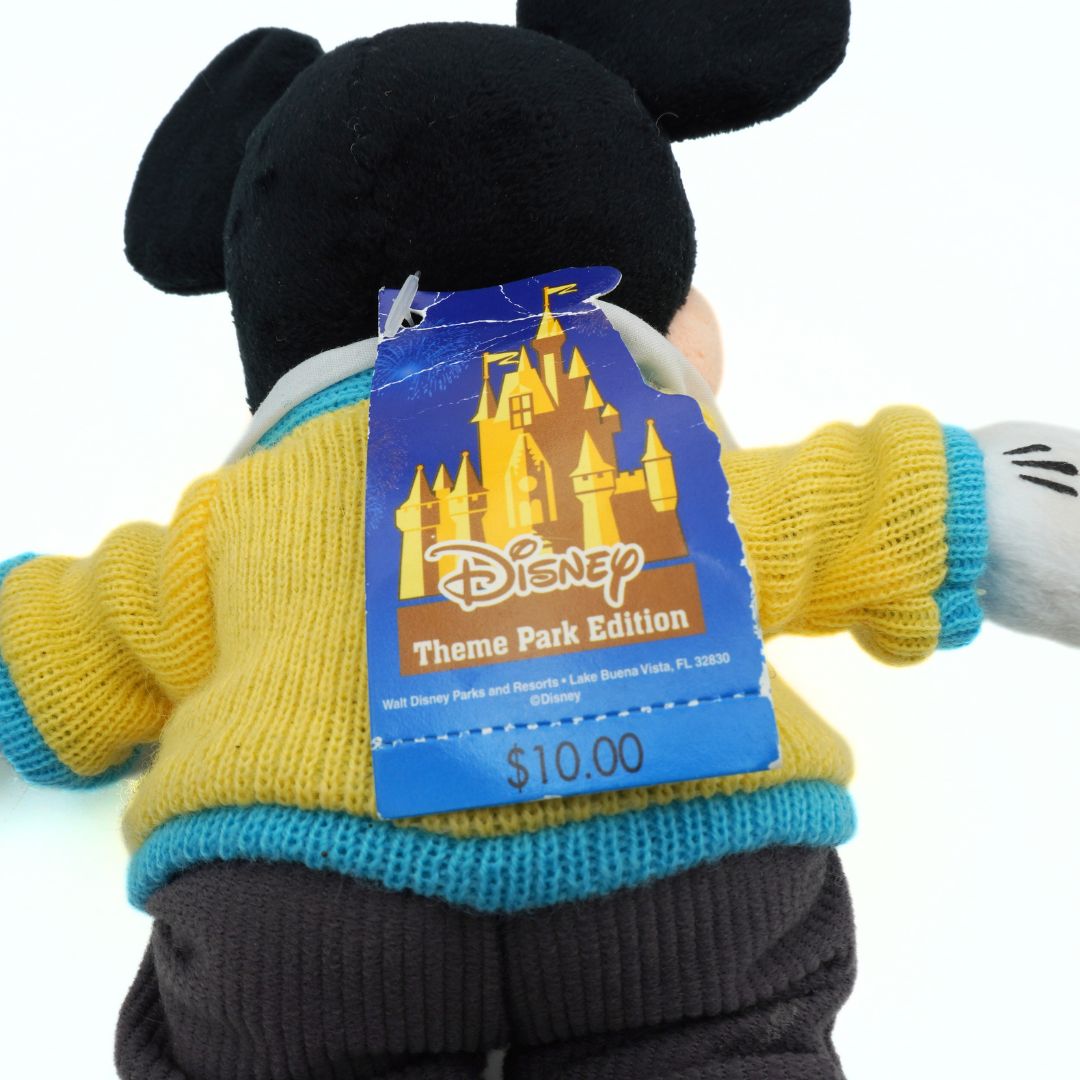 Plush toy with a Disney Theme Park Edition tag on a white background