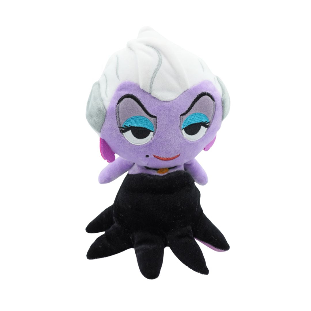 Plush toy of a character with purple skin, white hair, and black outfit on a white background