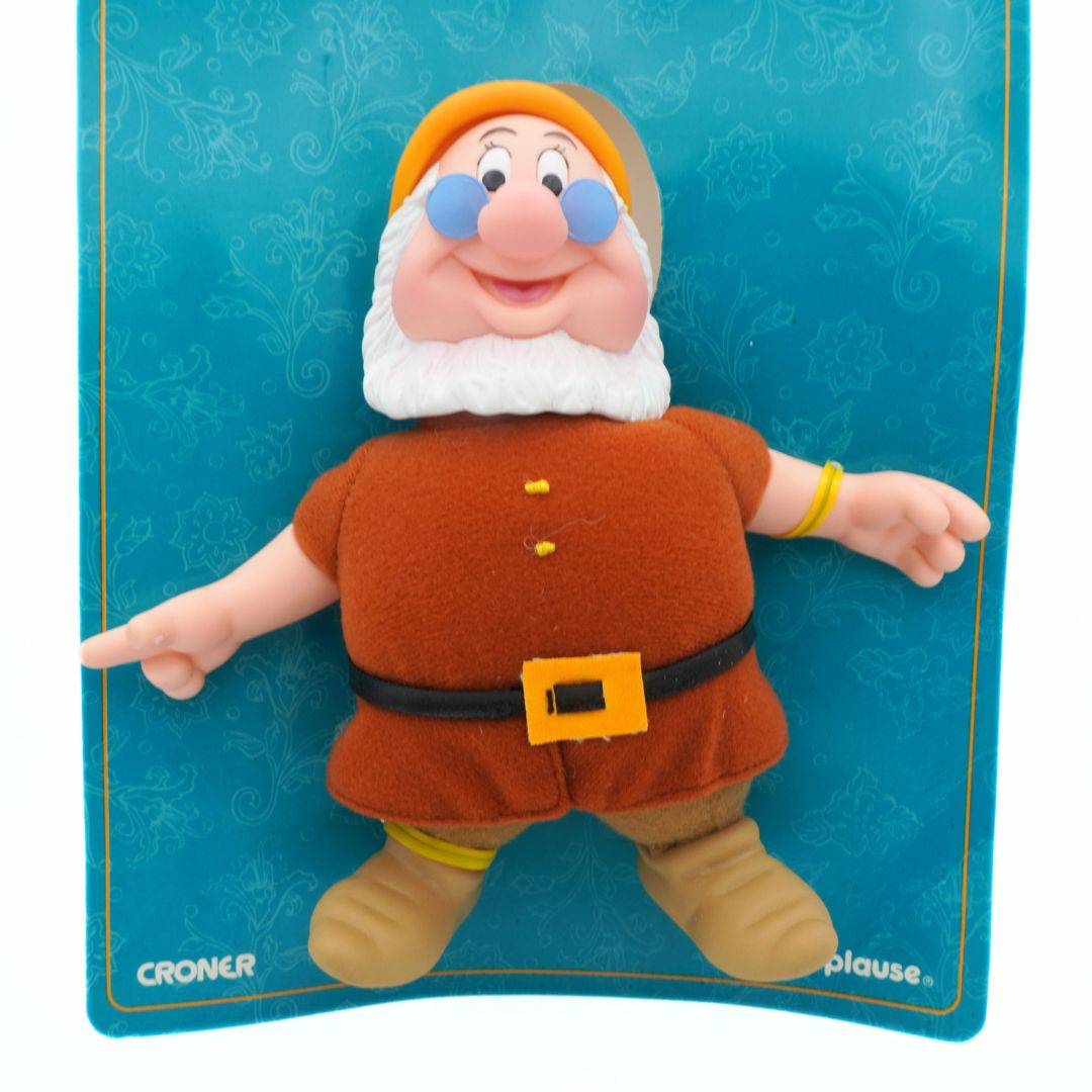 Toy figure of a dwarf on a blue card with 'Croner' and 'Applause' branding