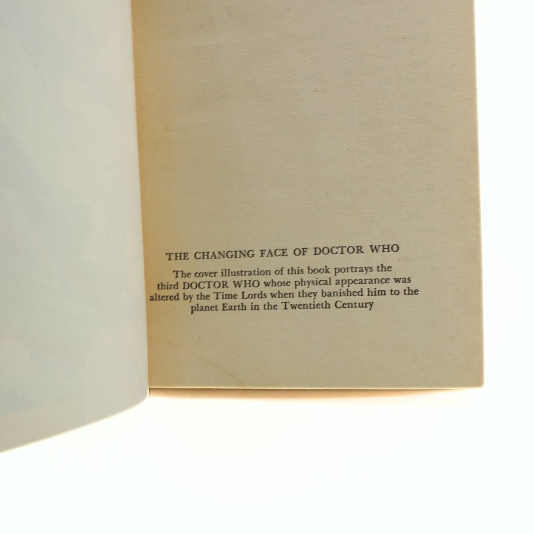 Book with text about the 'Changing Face of Doctor Who' on a white background