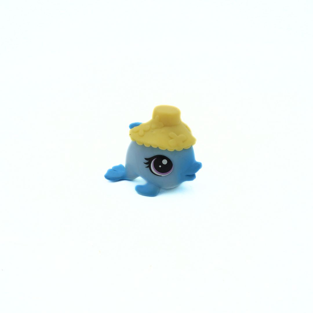 Small blue figurine with a yellow hat on a white background