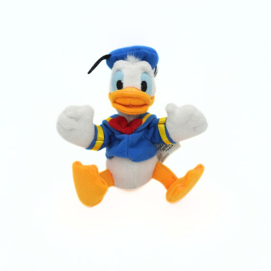Plush toy of a Donald Duck with a blue hat and orange shoes on a white background