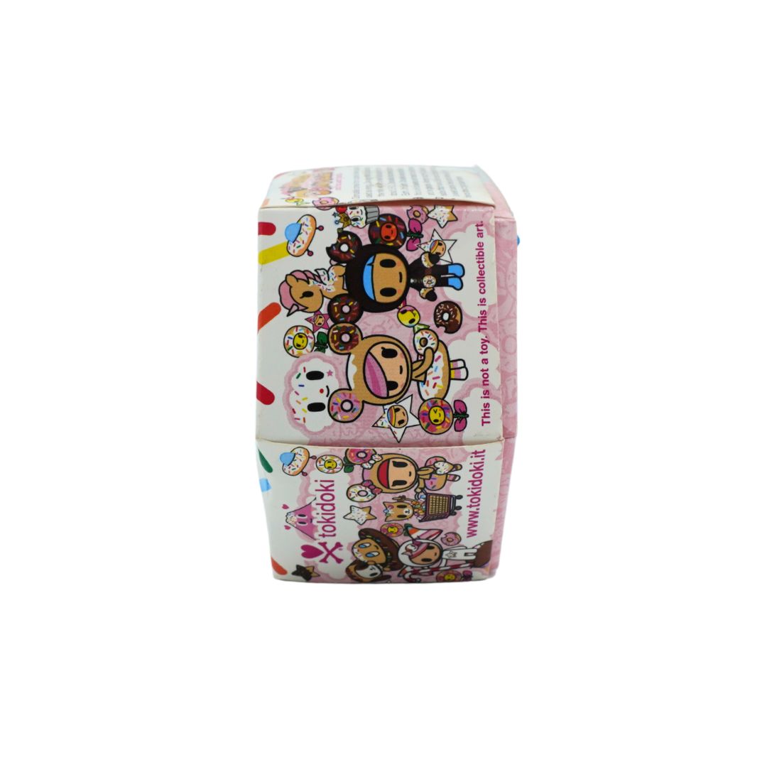 Donut themed hexagonal box for Donutella and her Sweet Friends by Tokidoki, photographed on a white background