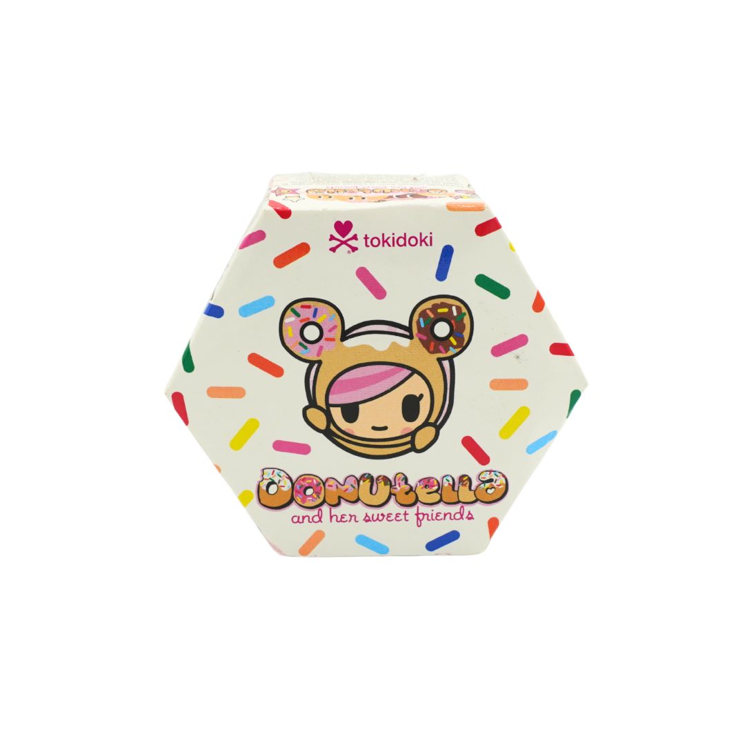 Donut themed hexagonal box for Donutella and her Sweet Friends by Tokidoki, photographed on a white background