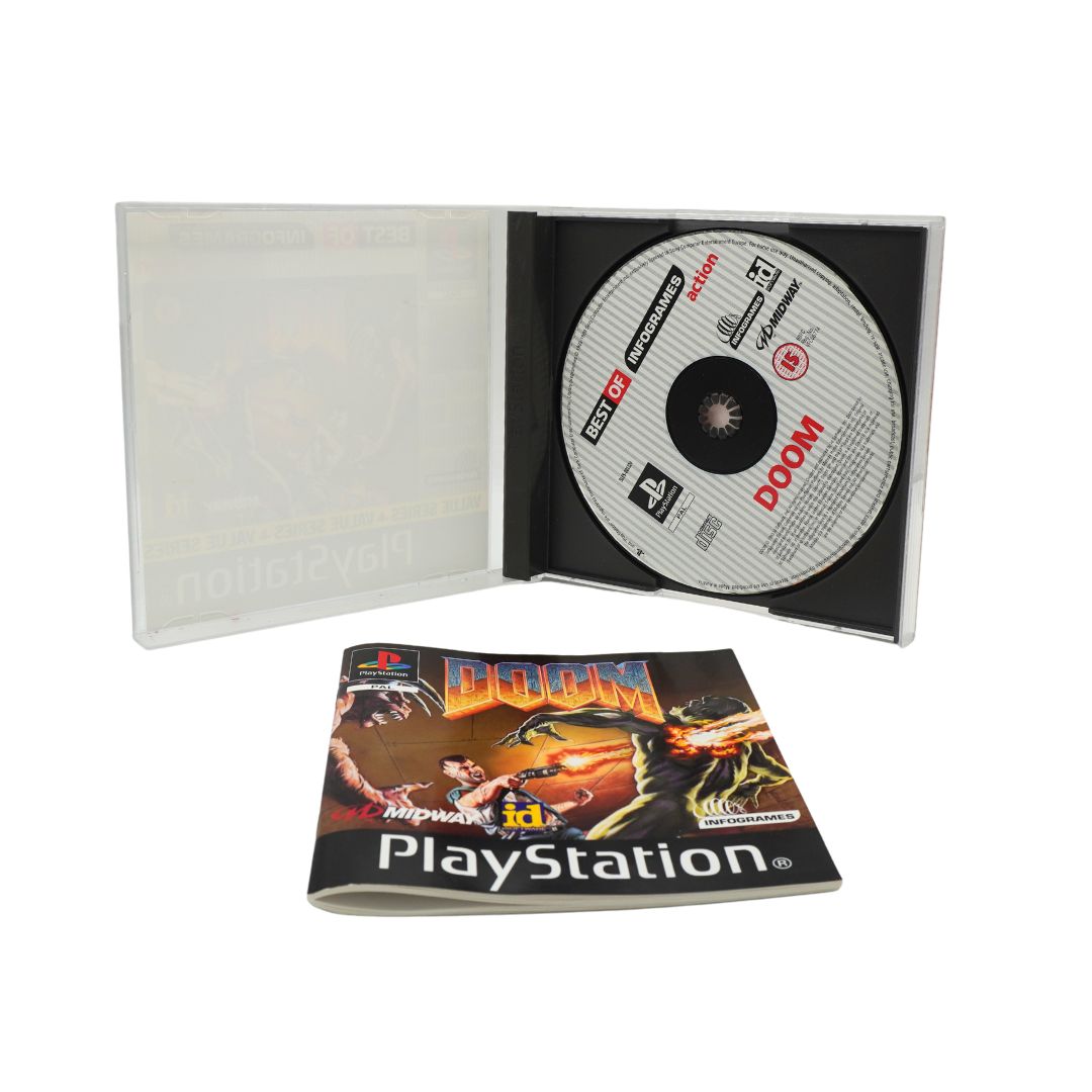 Inside of a vintage Playstation game of Doom, photographed against a white background