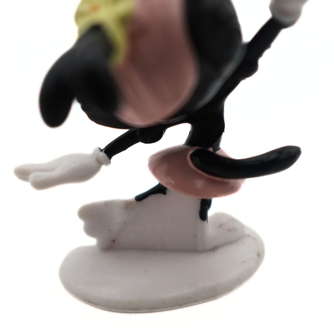 Close up photo of a small 90s Animaniacs Dot Warner figurine