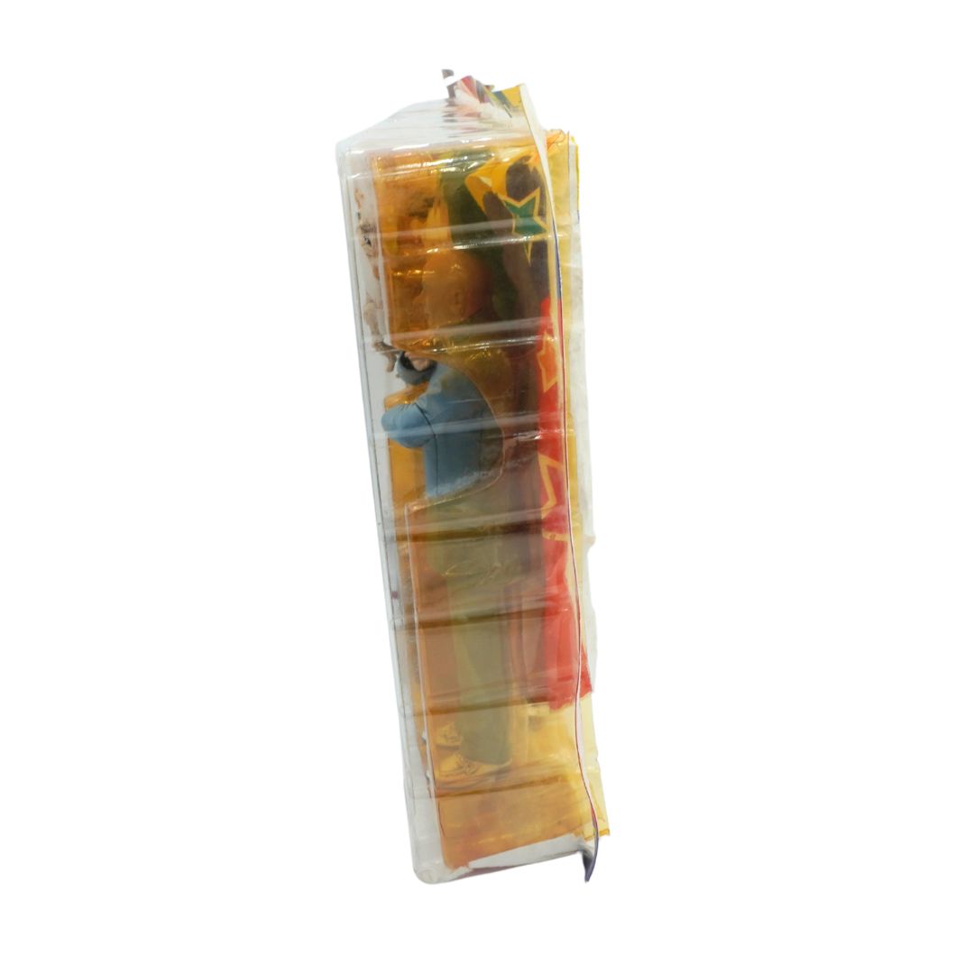 Colorful toy in a clear plastic packaging on a white background