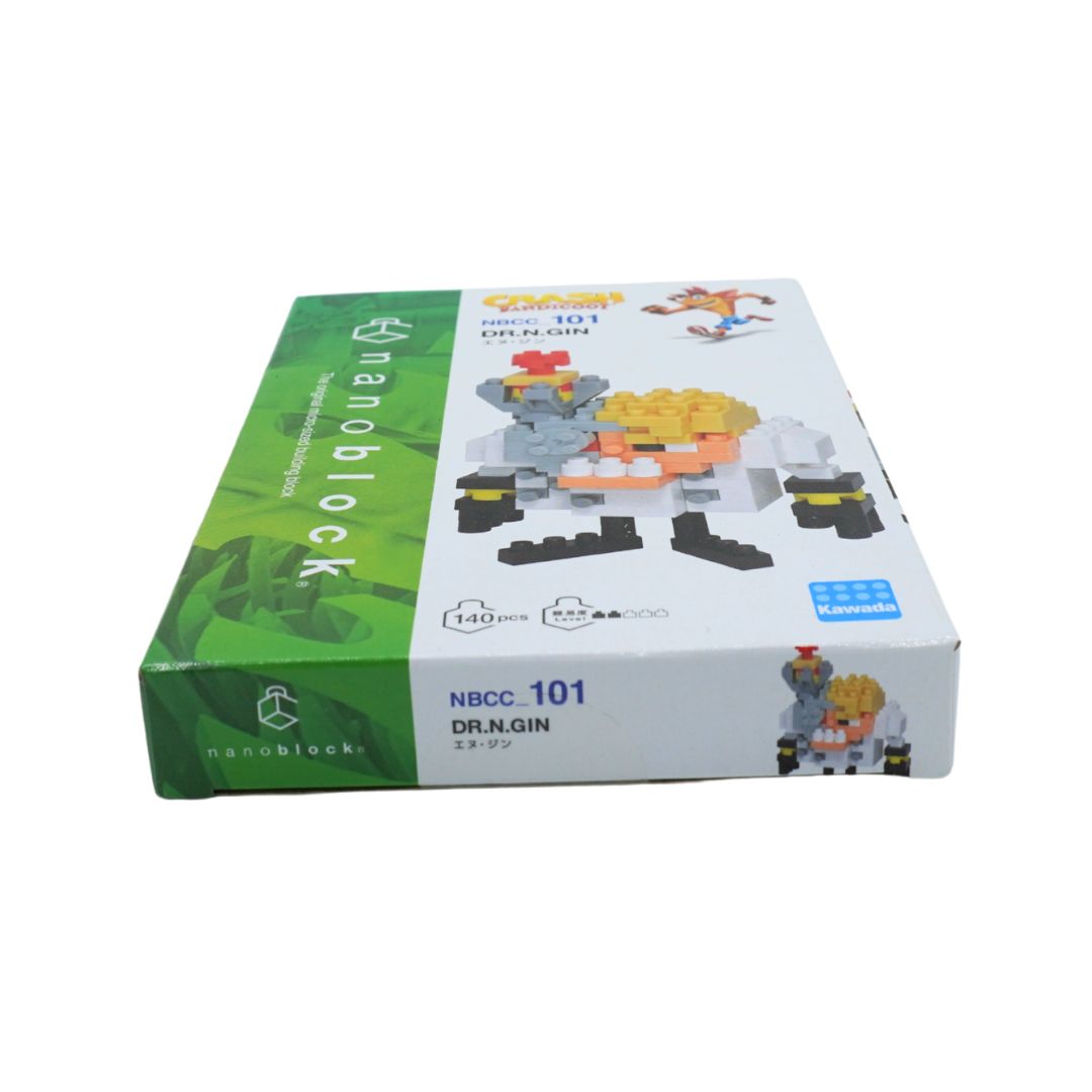 A boxed toy building block set on a plain white background. The box is white with a green side panel and printed graphics showing the assembled model and product details.