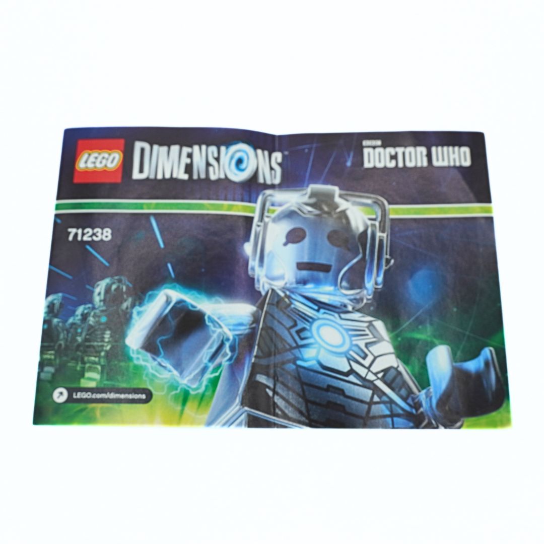 LEGO Dimensions Doctor Who minifigure box art, showing a silver and black armored minifigure with glowing blue energy effects. The LEGO Dimensions and Doctor Who logos are visible at the top, with the set number 71238 on the left.