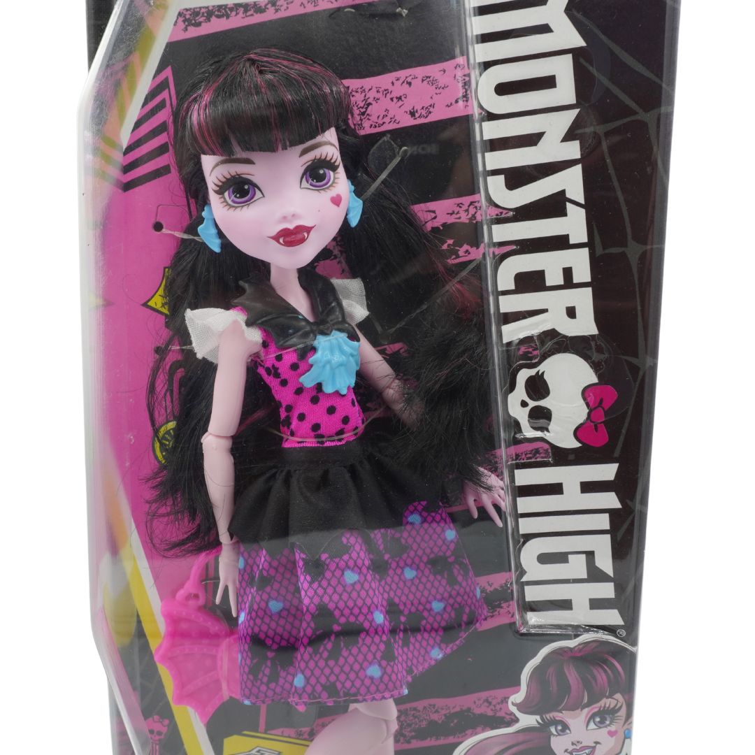 Monster High doll in packaging with pink and black design