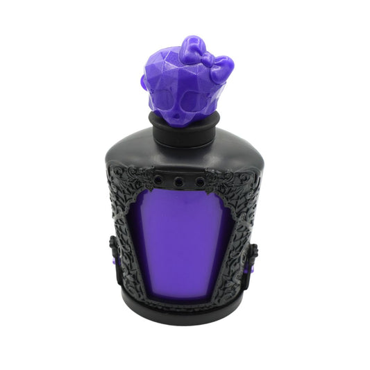A black decorative bottle with a glowing purple interior and a sculpted purple skull-shaped stopper, shown on a plain white background.