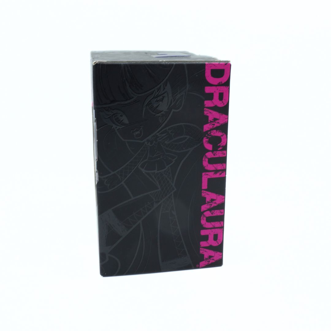 Black box with 'Draculaura' text and character design on a white background