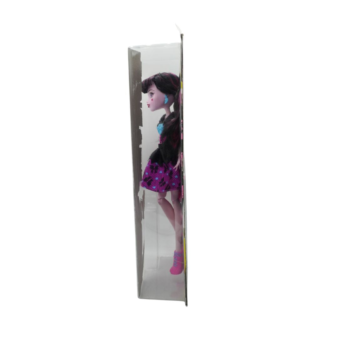  Doll in a standing position with a floral dress and pink shoes on a white background