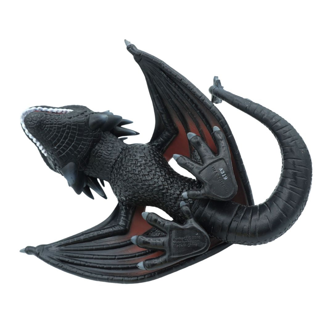 A black dragon figurine with detailed scales, spread wings, and a curled tail, shown against a plain white background.