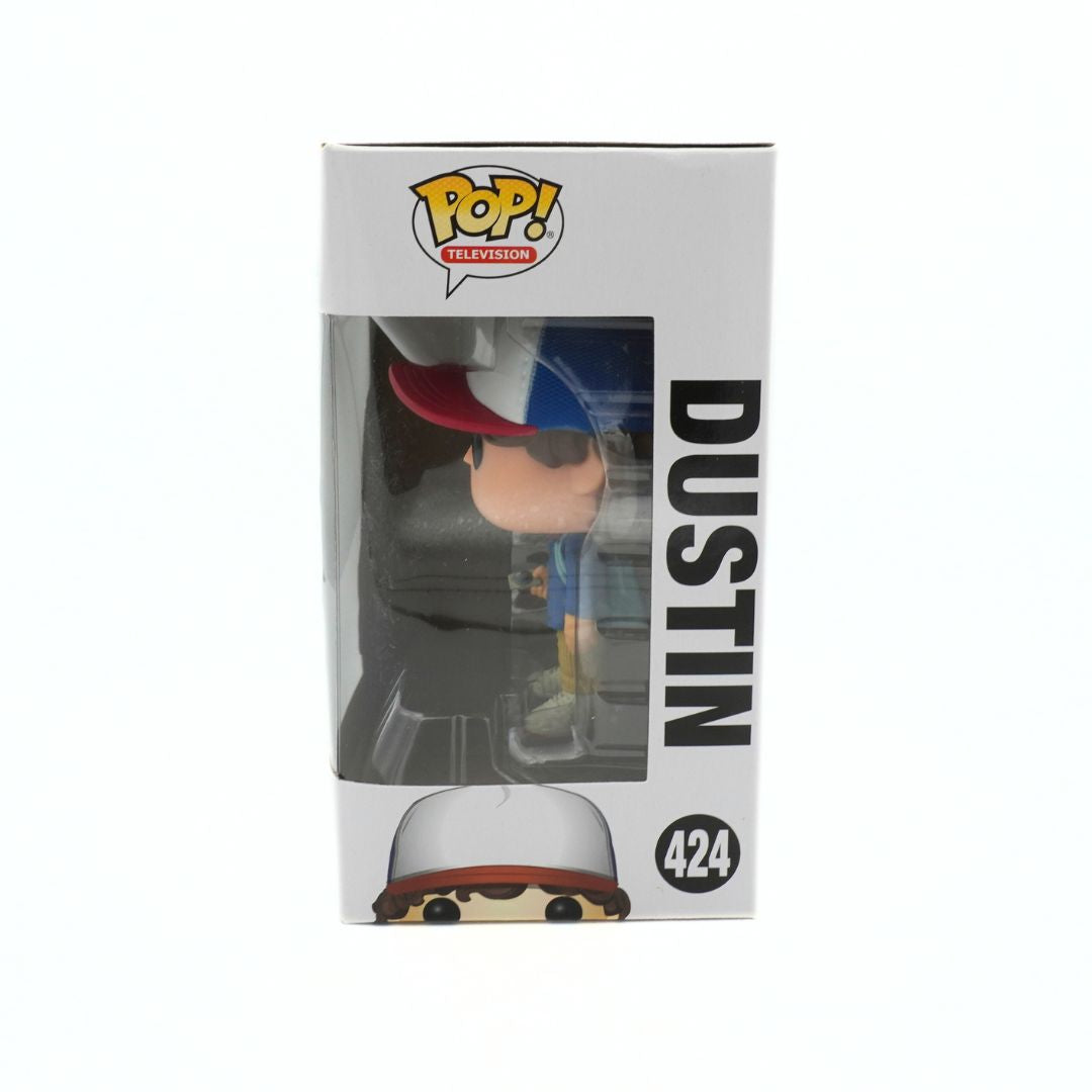 Funko Pop! packaging with 'Dustin' figure inside, on a white background