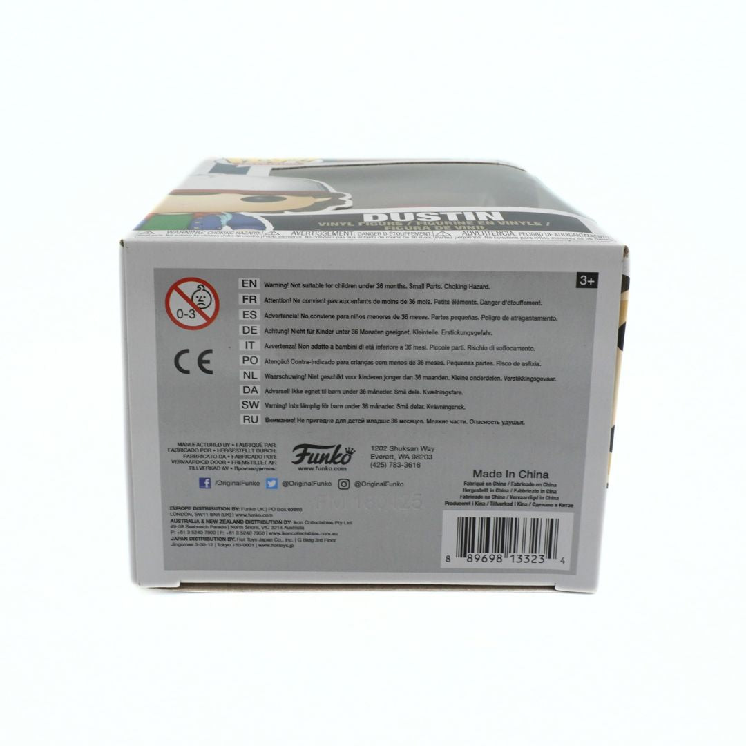 Back view of a toy packaging with branding and product details on a white background