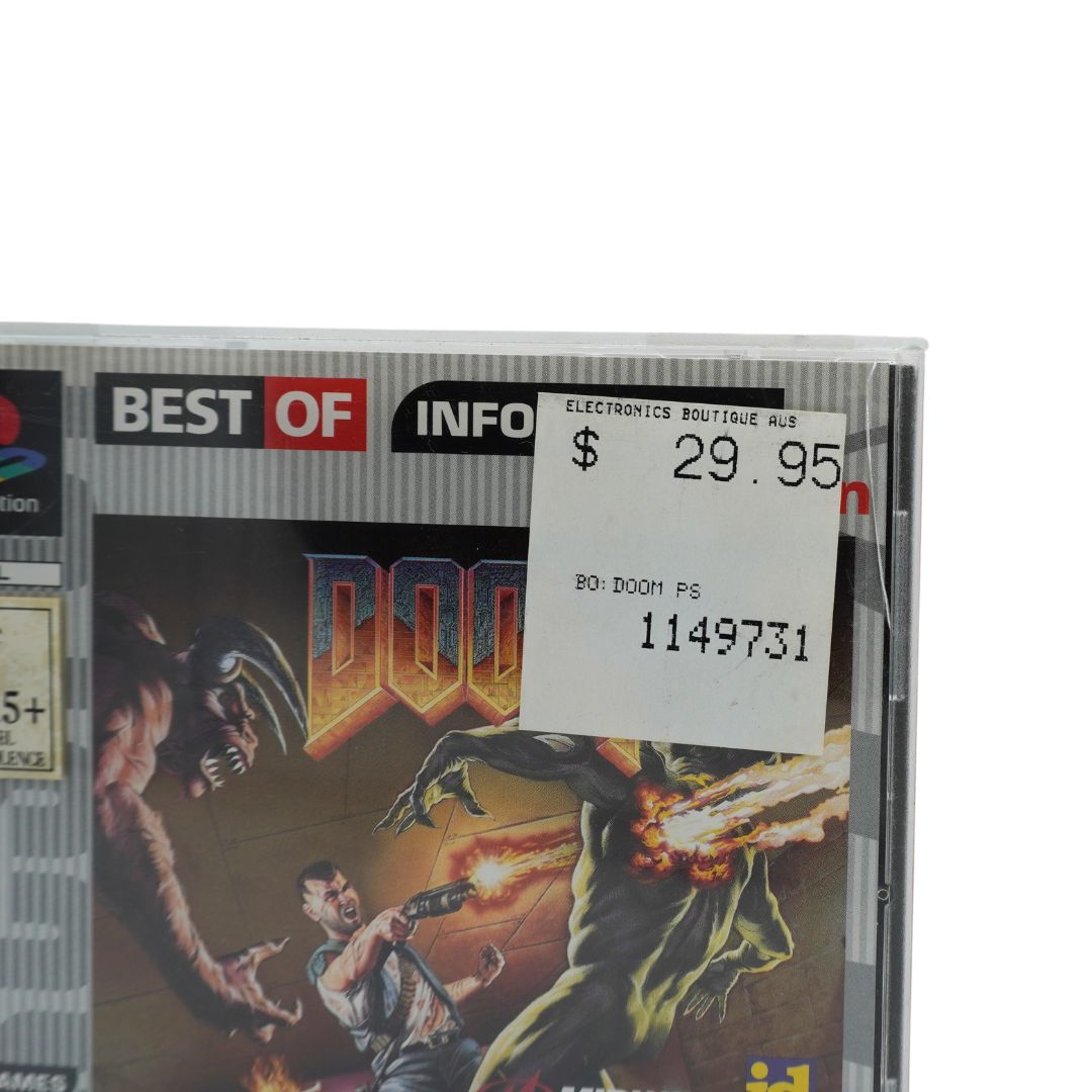 Corner of a vintage game of Doom on Playstation showing a price tag