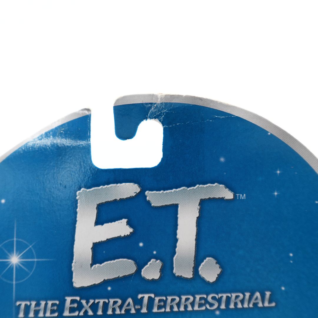 Damage to hanging section of the ET Girl Disguise cardback