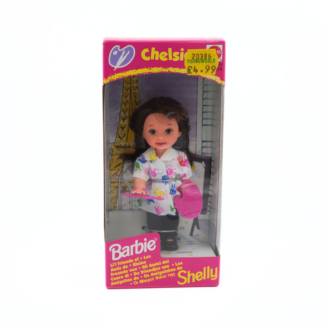 Barbie Chelsea doll packaging with Eiffel Tower in the background