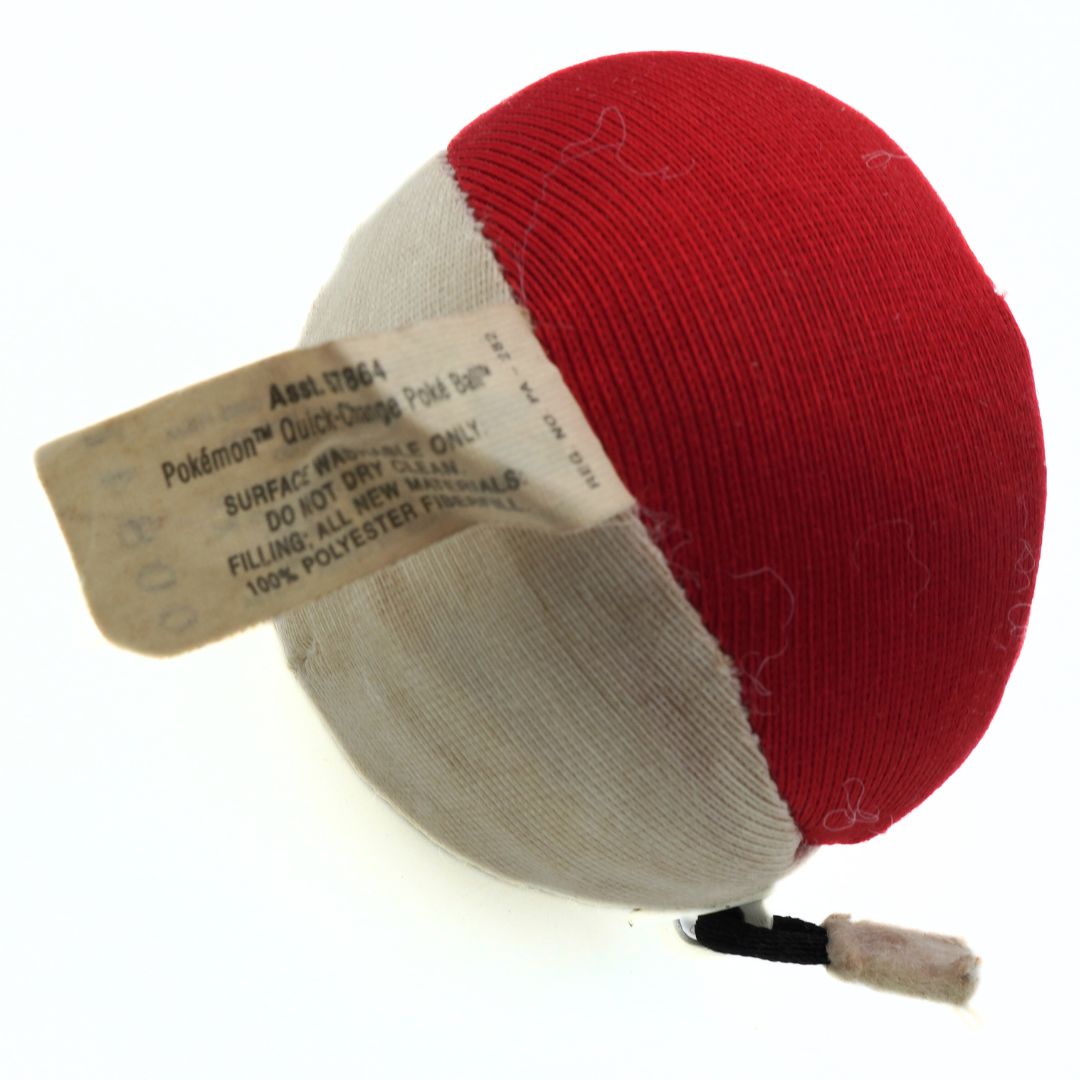 Red and gray spherical pouch with a tag on a white background