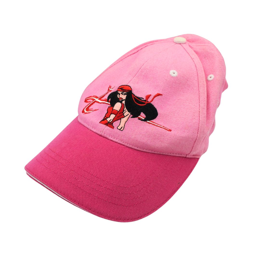 A pink baseball cap featuring an embroidered anime character on the front, set against a plain white background.