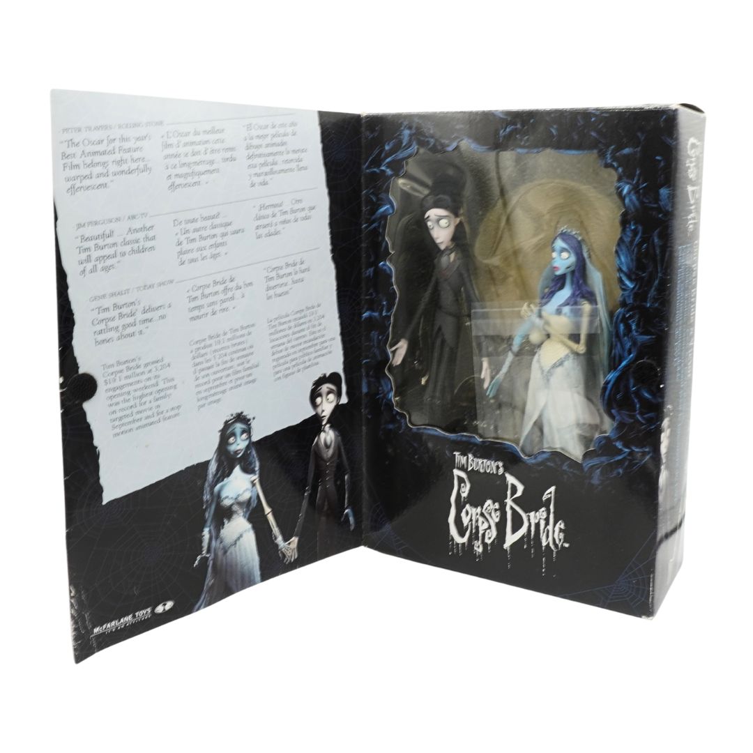 Open box containing Emily and Victor from 'The Corpse Bride' with character illustrations on a white background.