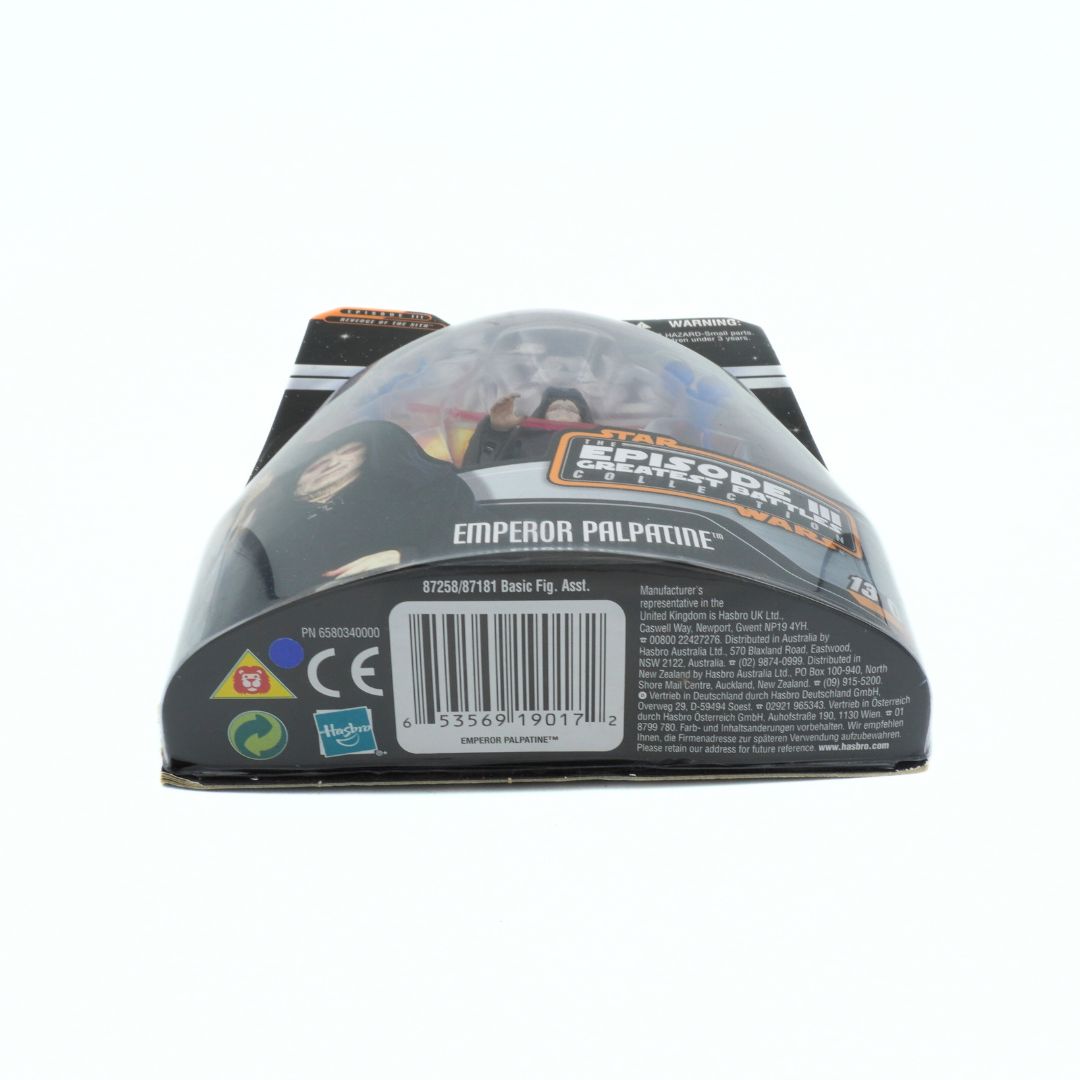 Packaged toy figure of Emperor Palpatine with branding and product details on a white background