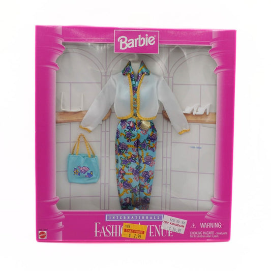 Barbie doll packaging with doll and outfit inside, on a white background