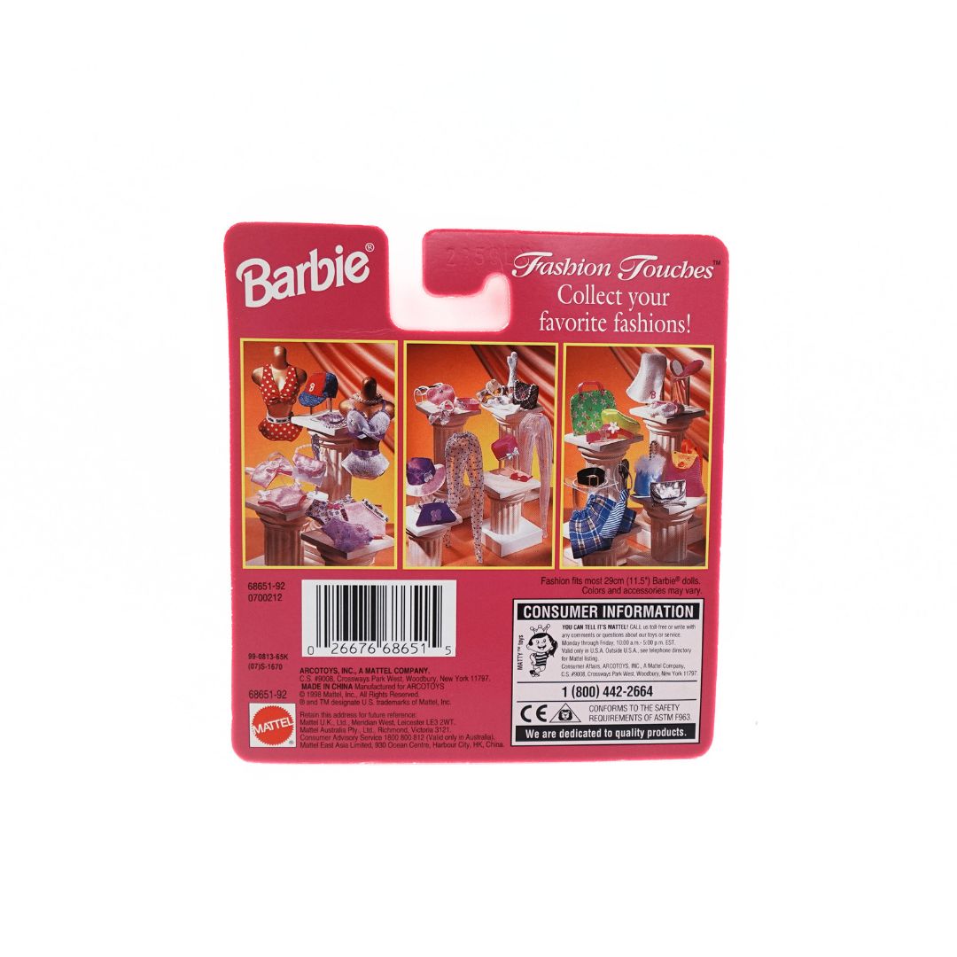 Back cover of a 90s Fashion Touches accessory set for Barbie with photos of the full range